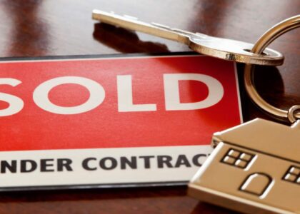 hidden costs of selling a house with Sold sign showing house under contract